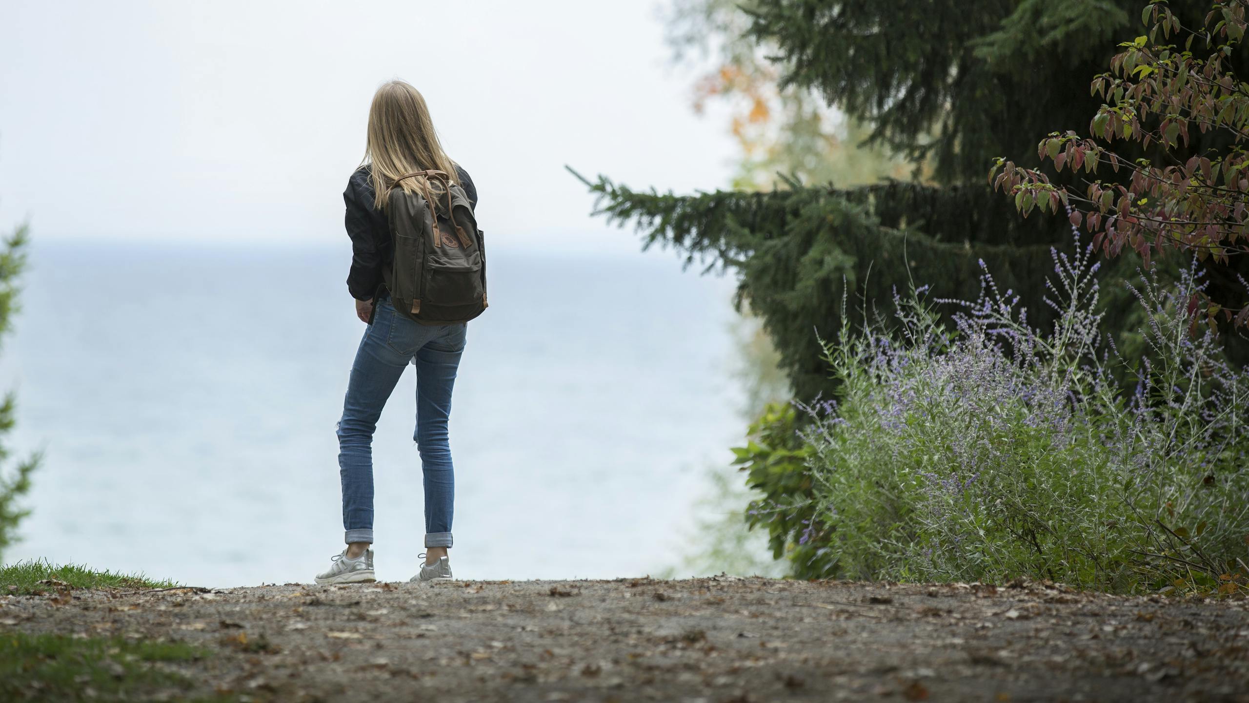 Woman Wearing Backpack