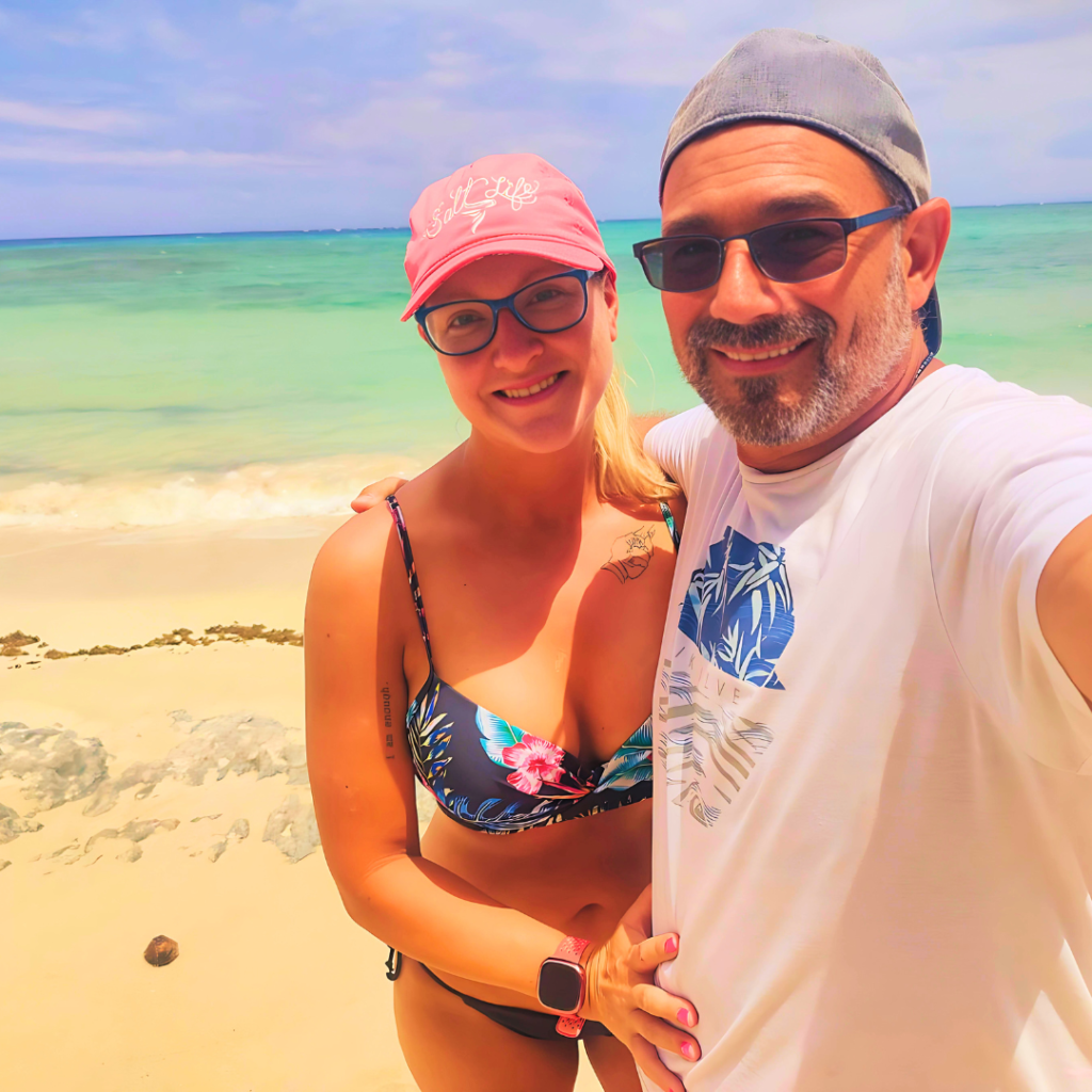 Elizabeth and her husband on the private beach in Fiji