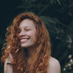 Smiling Woman With Red Hair